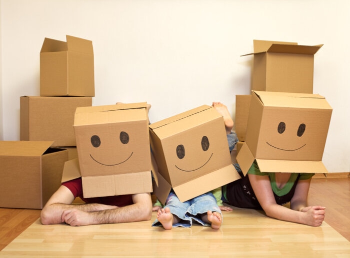 Smiley Moving Family Couple With A Kid