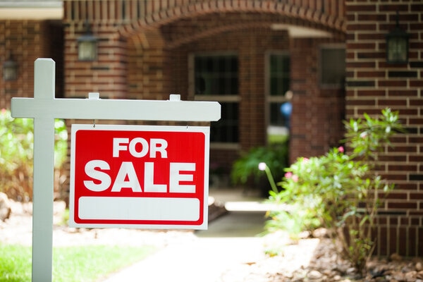 House For Sale Sign In Front Yard No People