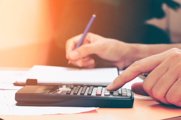Close Up Young Woman With Calculator Counting Making Notes Close Up Young Woman With Calculator Counting Making Notes