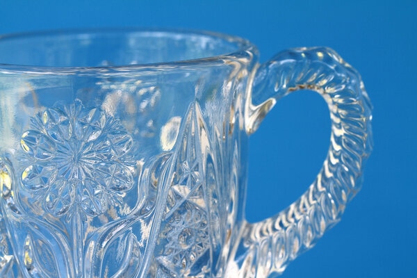 Macro Closeup Of Crystal Glass Sugar Bowl With Decorative Etchings